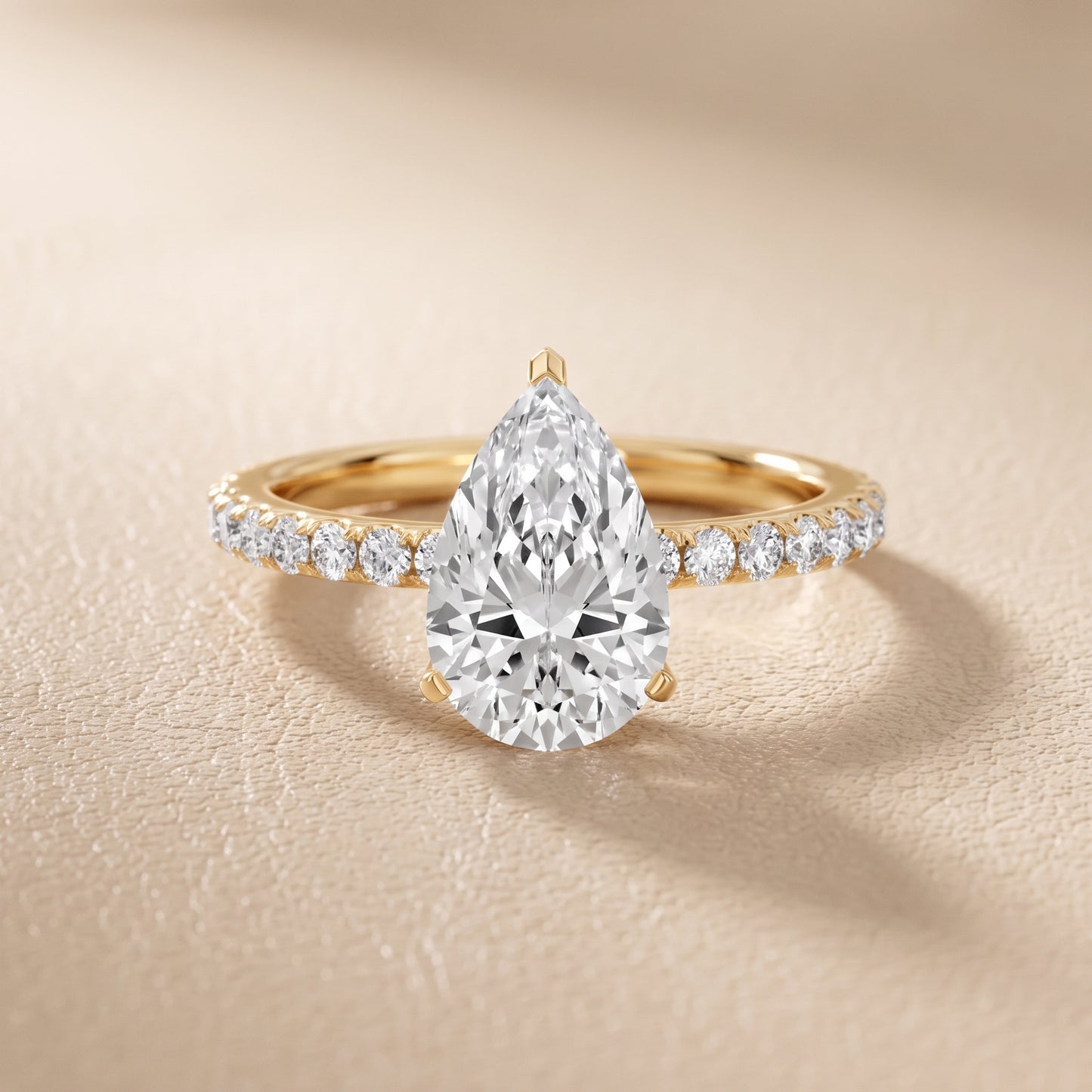 Juna French Pavé Solitaire Pear Diamond Engagement Ring in Yellow Gold - front.jpg