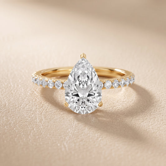 Juna French Pavé Solitaire Pear Diamond Engagement Ring in Yellow Gold - front.jpg