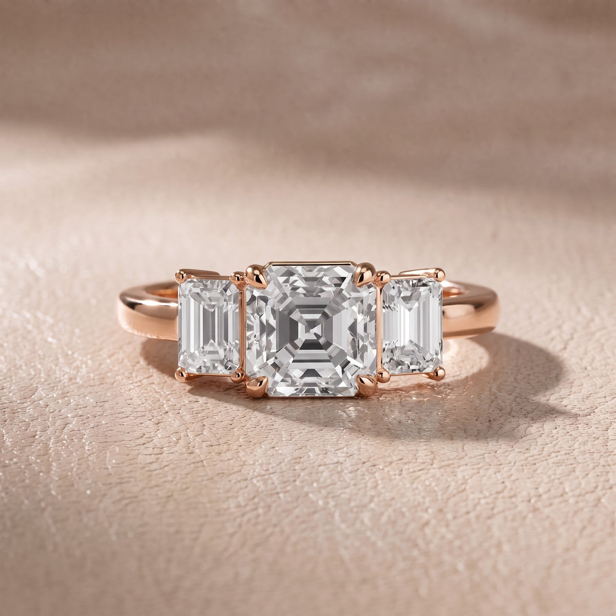 Zoe Three-Stone Asscher Diamond Engagement Ring in Rose Gold - front.jpg