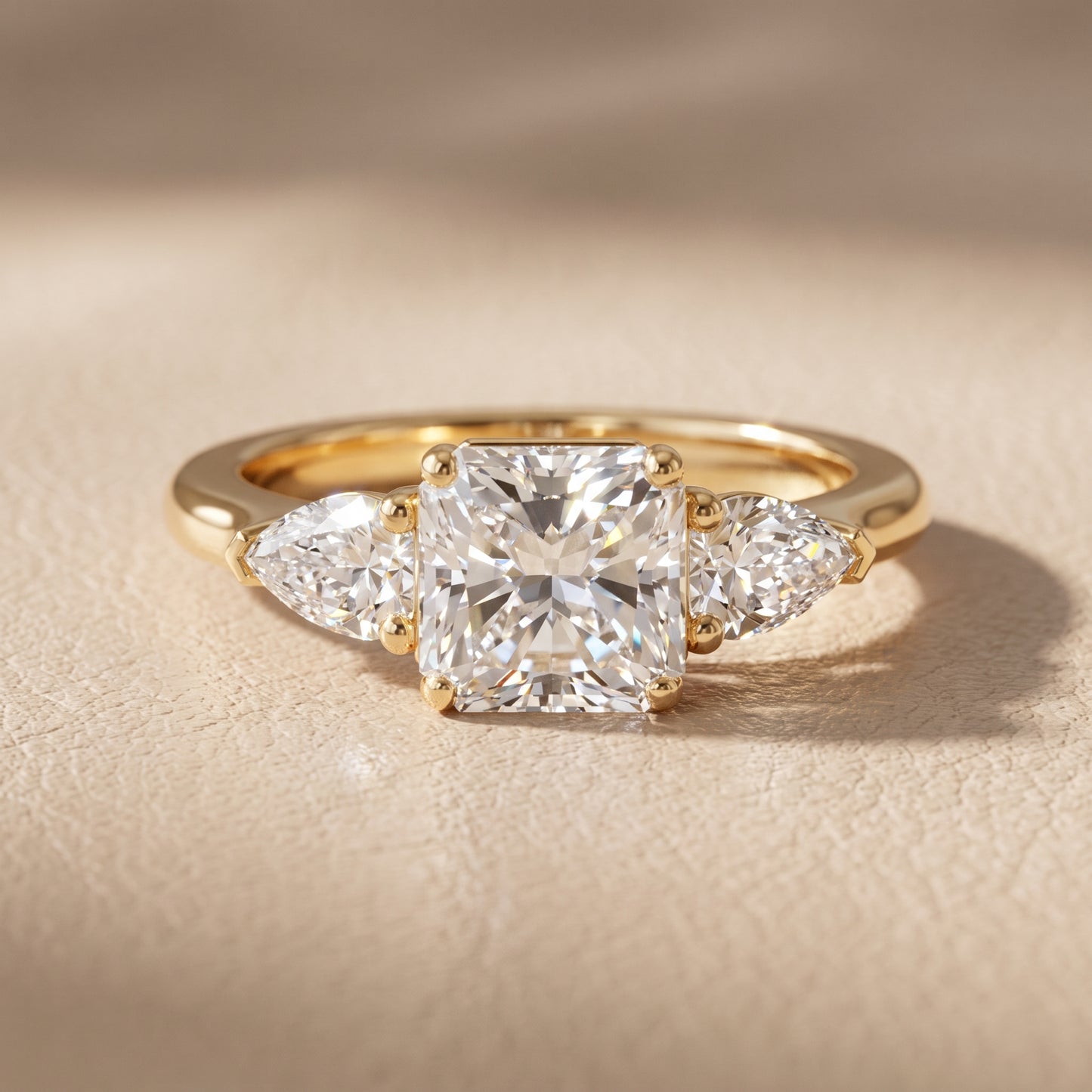 Mirabel Three-Stone Radiant Diamond Engagement Ring in Yellow Gold - front.jpg
