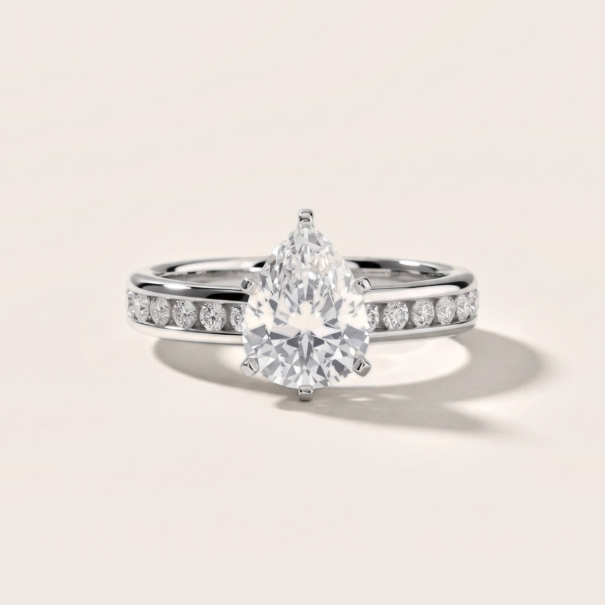 Avalon Channel Set Pear Diamond Engagement Ring in Platinum - front.jpg