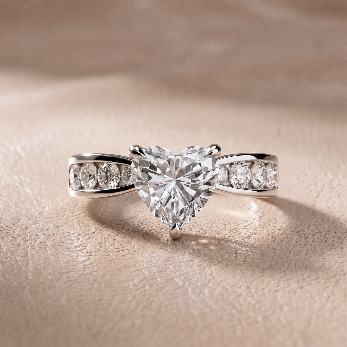 Rosalie Channel Set Sidestone Heart Diamond Engagement Ring in Platinum - front.jpg