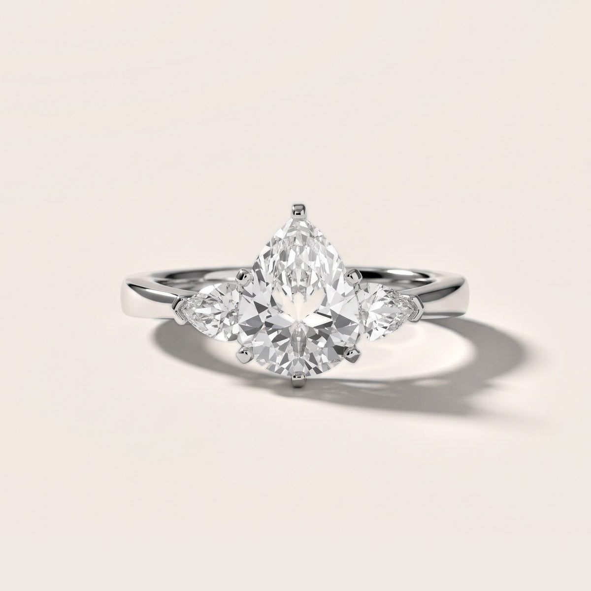 Amabel Three-Stone Pear Diamond Engagement Ring in Silver - front.jpg
