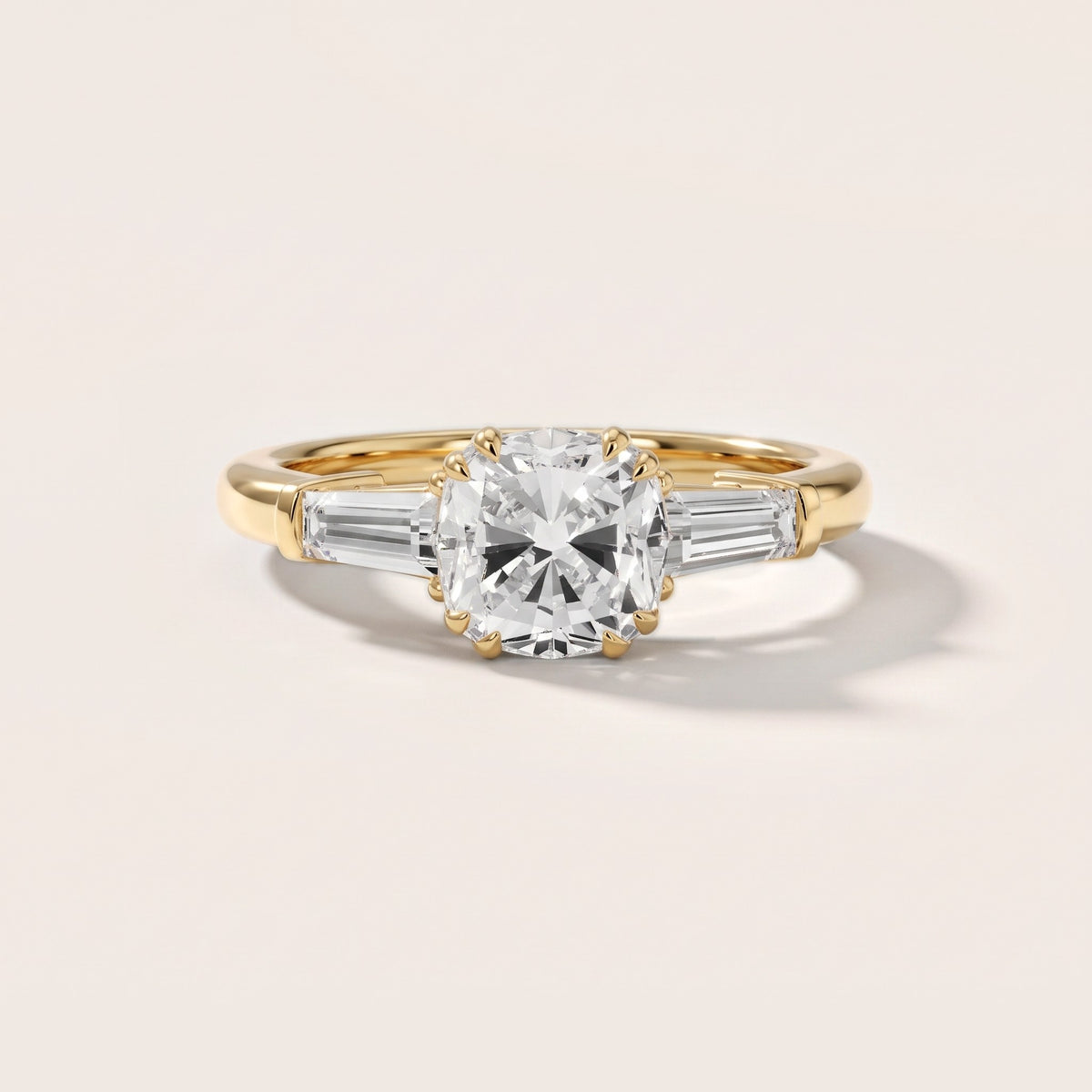 Betsy Baguette Three-Stone Cushion Diamond Engagement Ring in Yellow Gold - front.jpg