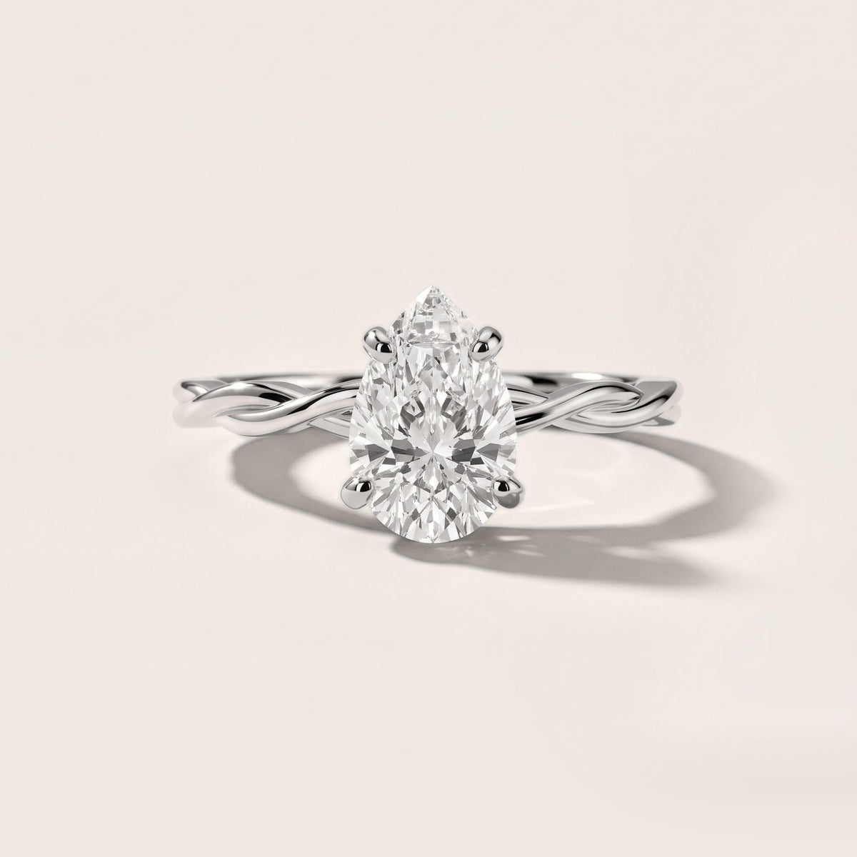 Iris Twist Pear Diamond Engagement Ring in Platinum [studio-20261024]