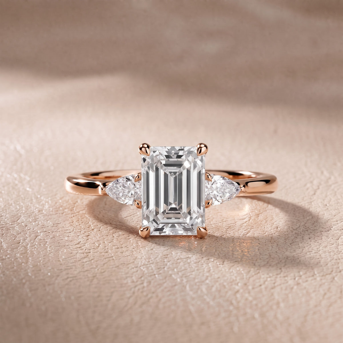 Leila Three-Stone Emerald Diamond Engagement Ring in Rose Gold - front.jpg