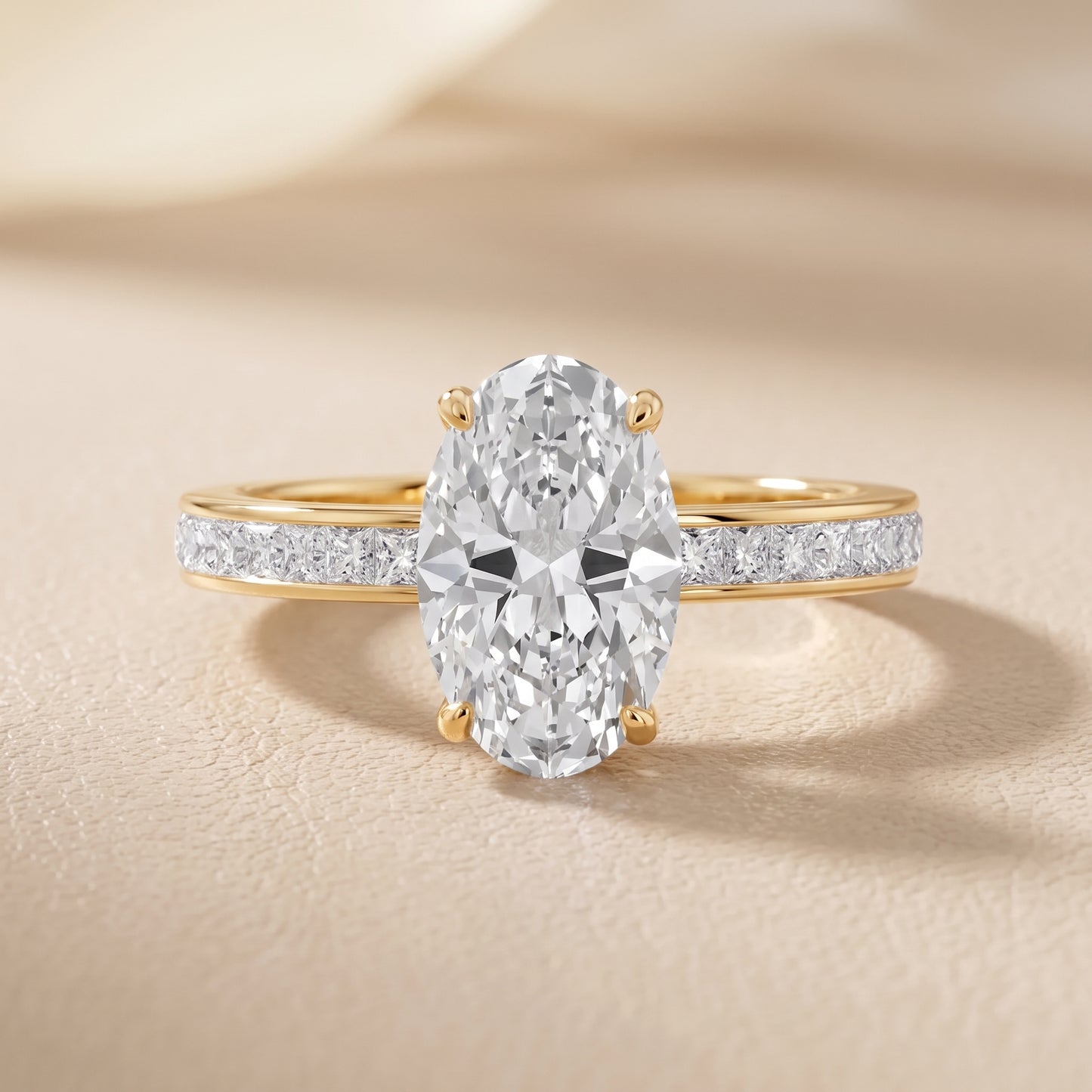 Brielle Channel Set Solitaire Oval Diamond Ring in Yellow Gold - front.jpg