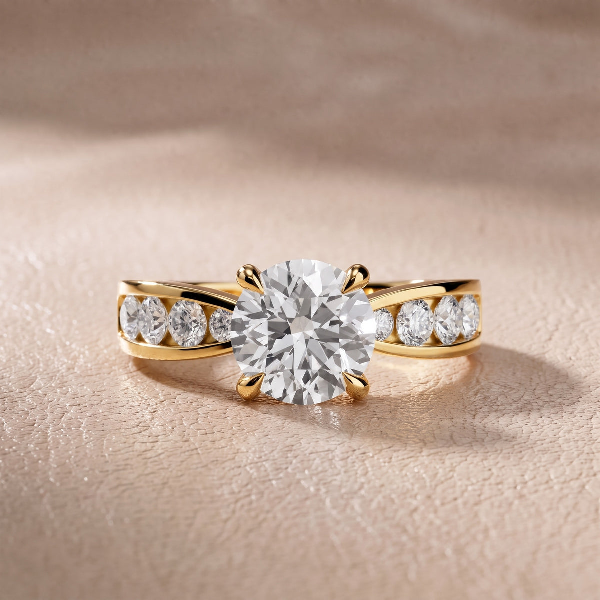 Rosalie Channel Set Sidestone Round Diamond Engagement Ring in Yellow Gold - front.jpg