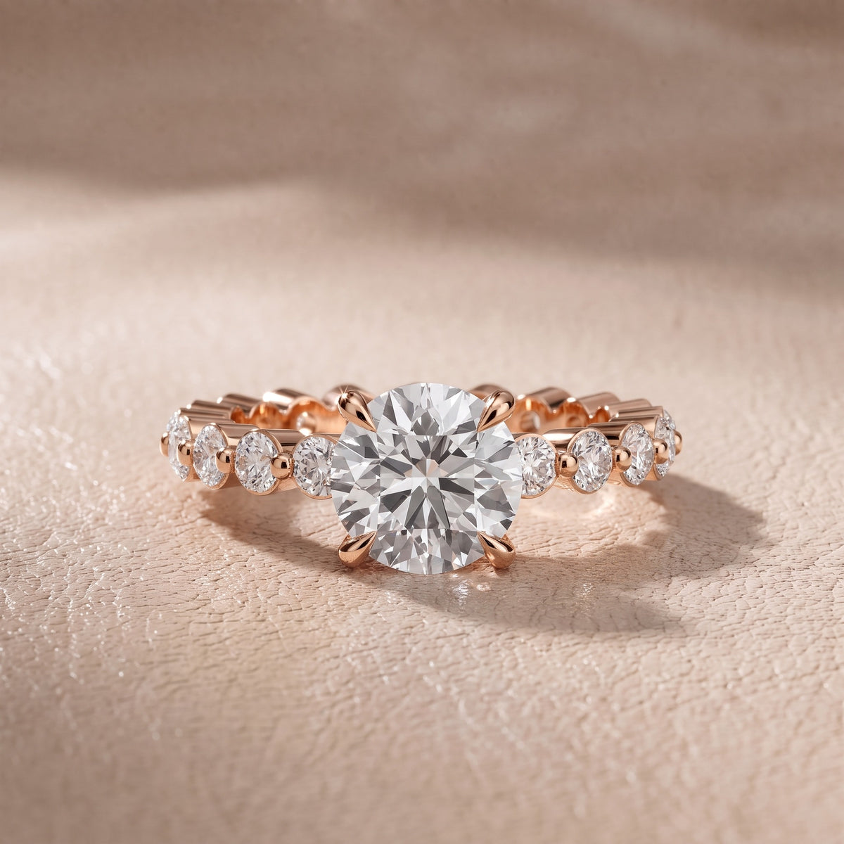 Piper Sidestone Round Diamond Engagement Ring in Rose Gold - front.jpg
