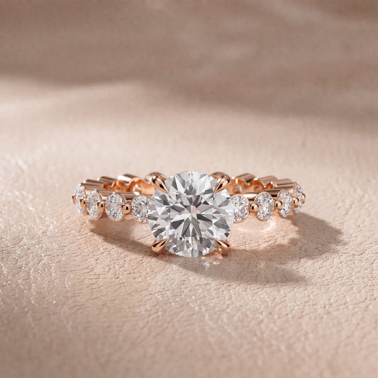 Piper Sidestone Round Diamond Engagement Ring in Rose Gold - front.jpg