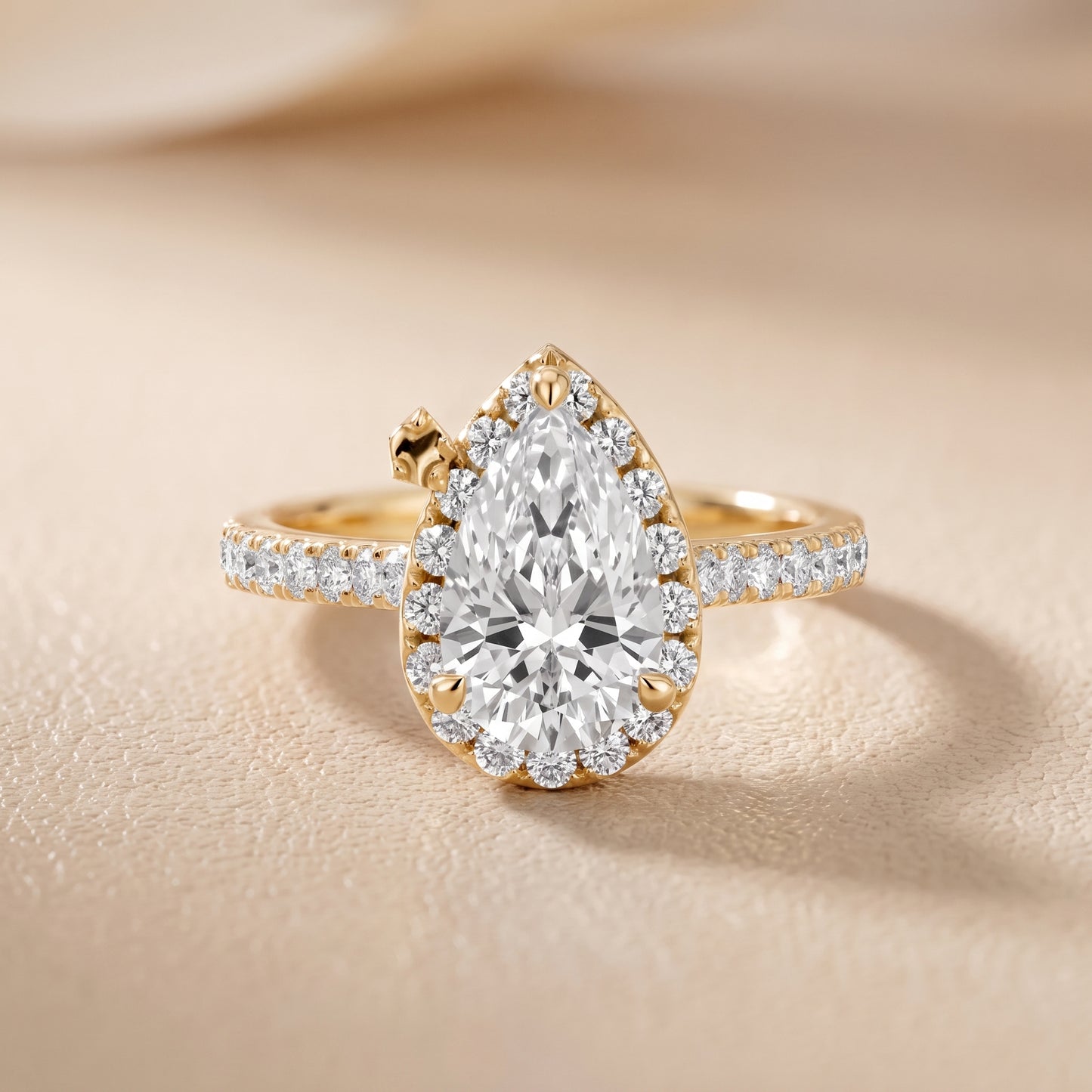 Amara Halo Claw Prong Pear Diamond Ring in Yellow Gold - front.jpg