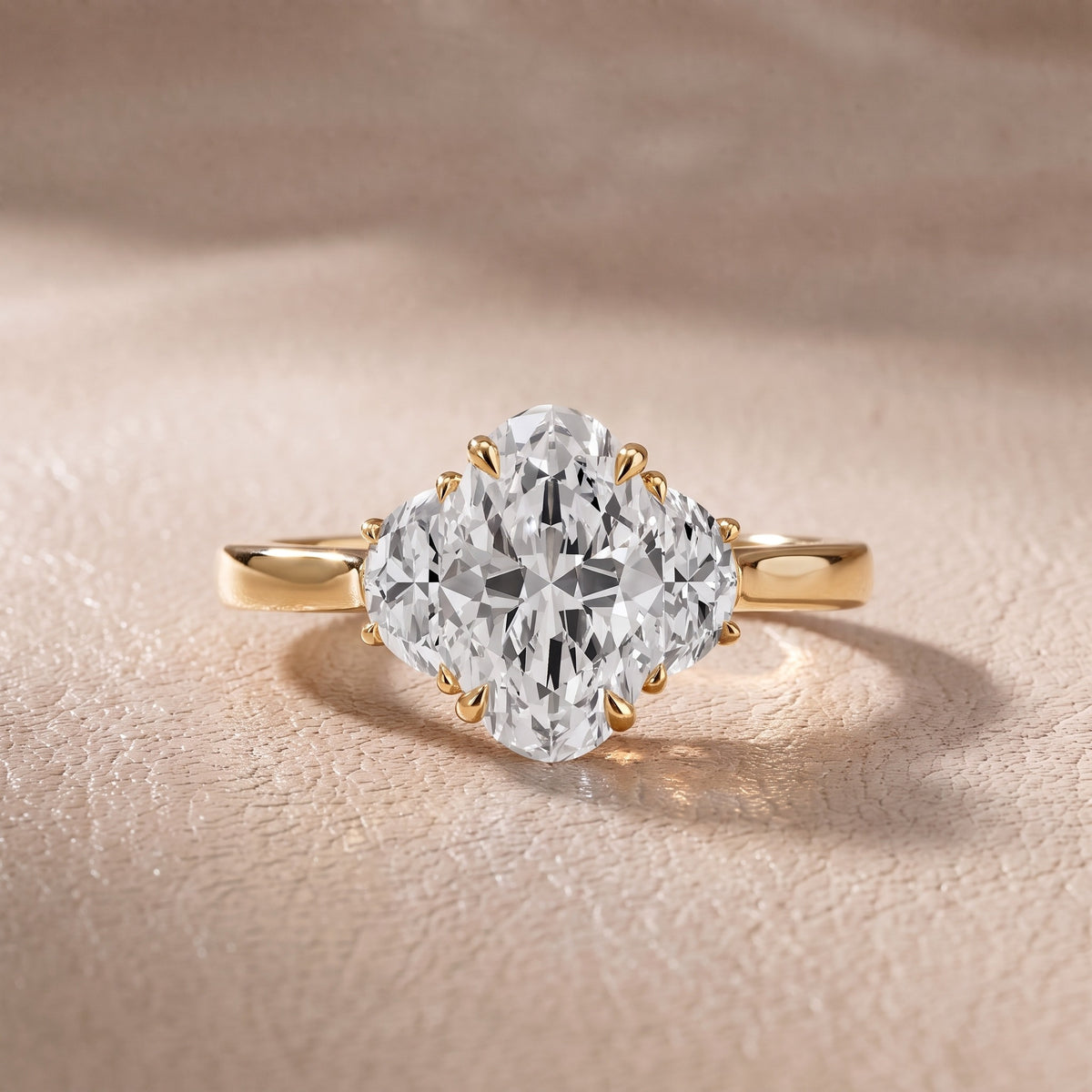 Romy Three-Stone Oval Diamond Engagement Ring in Yellow Gold - front.jpg