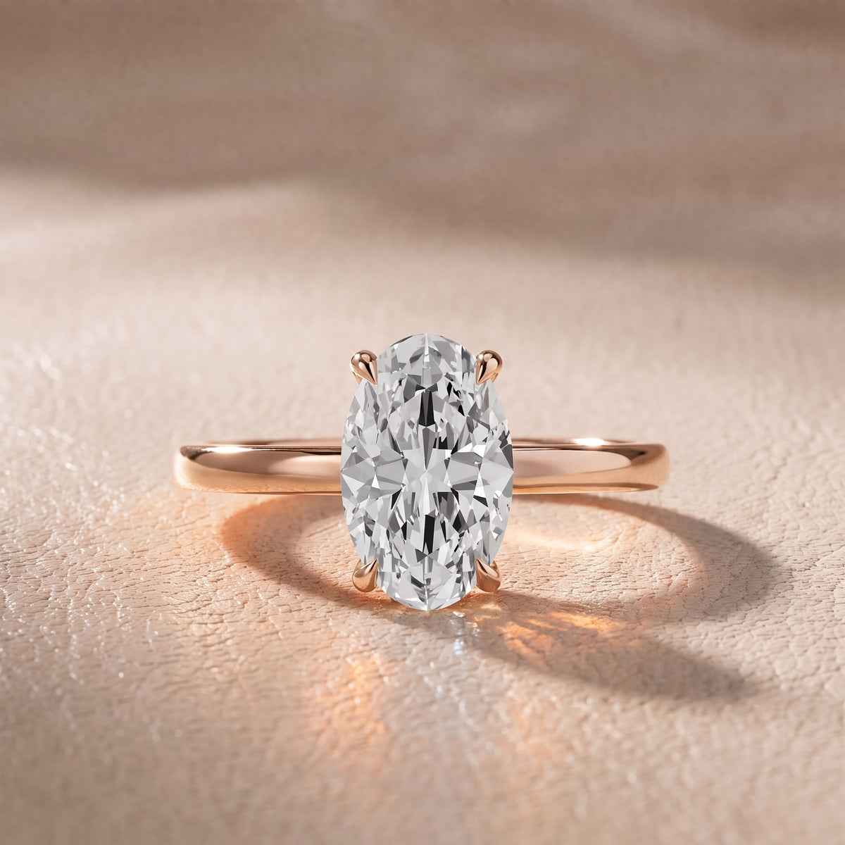 Nadia Petite Solitaire Oval Diamond Engagement Ring in Rose Gold - front.jpg