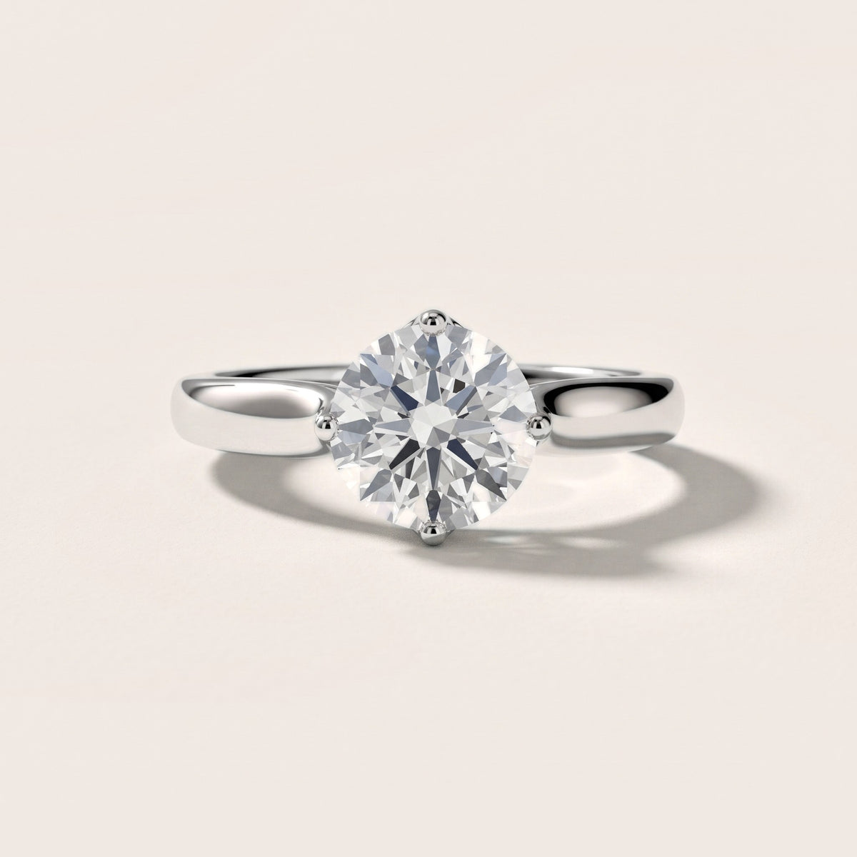 Edwina Crossover Solitaire Round Diamond Engagement Ring in White Gold - front.jpg