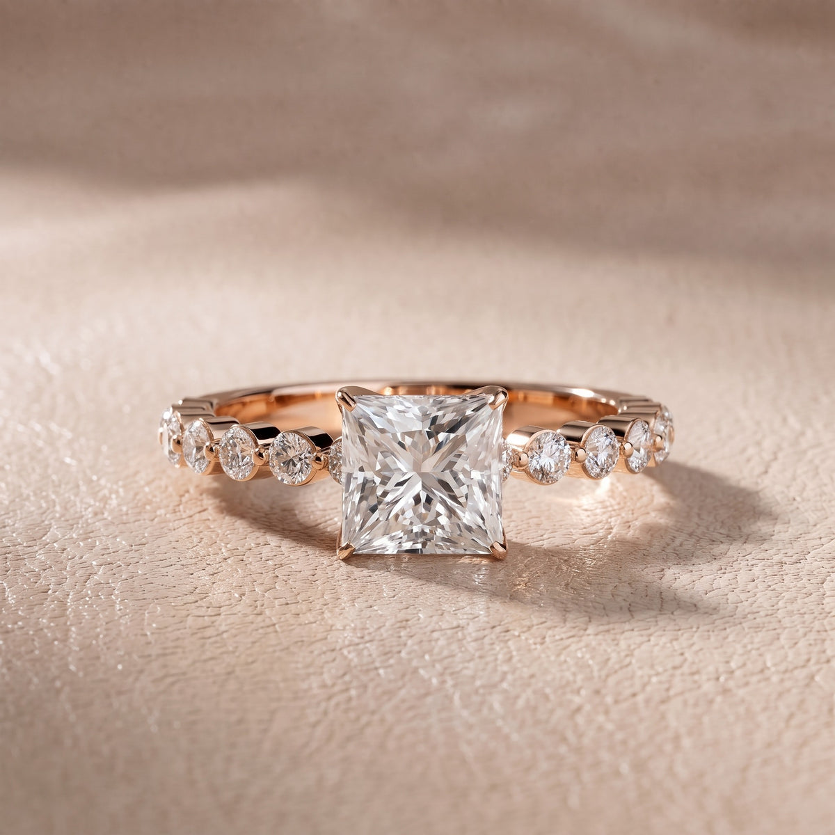 Eleanor Majesty Side Stone Princess Diamond Engagement Ring in Rose Gold - front.jpg