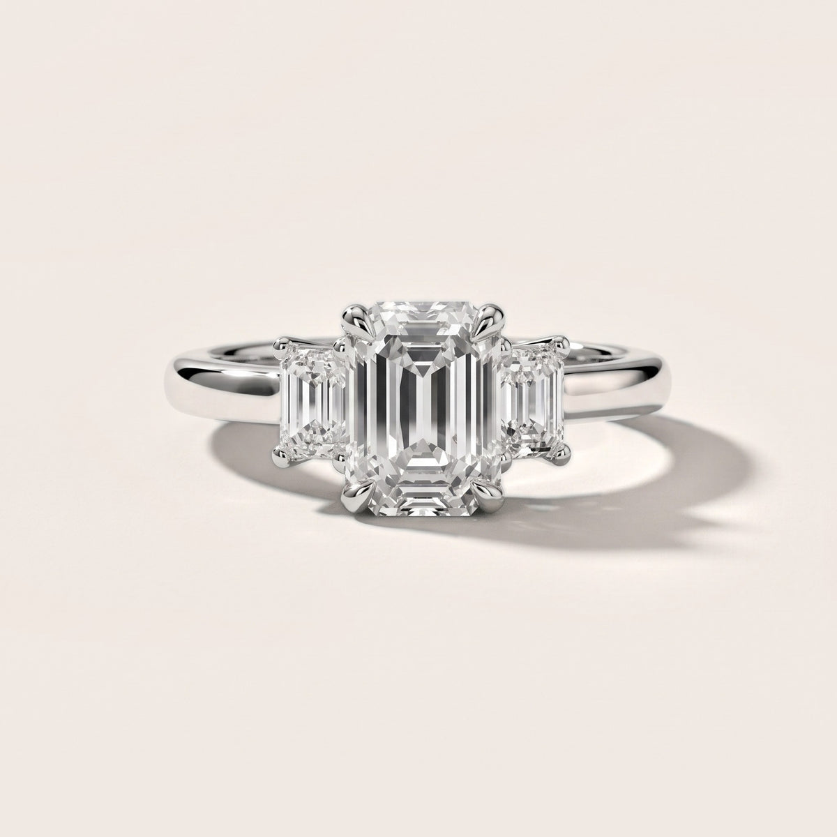 Babette Deco Three-Stone Emerald Diamond Engagement Ring in Silver - front.jpg