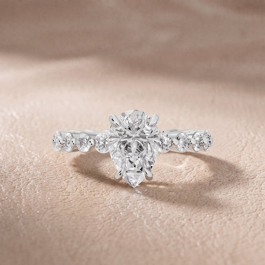 Piper Sidestone Pear Diamond Engagement Ring in Platinum - front.jpg