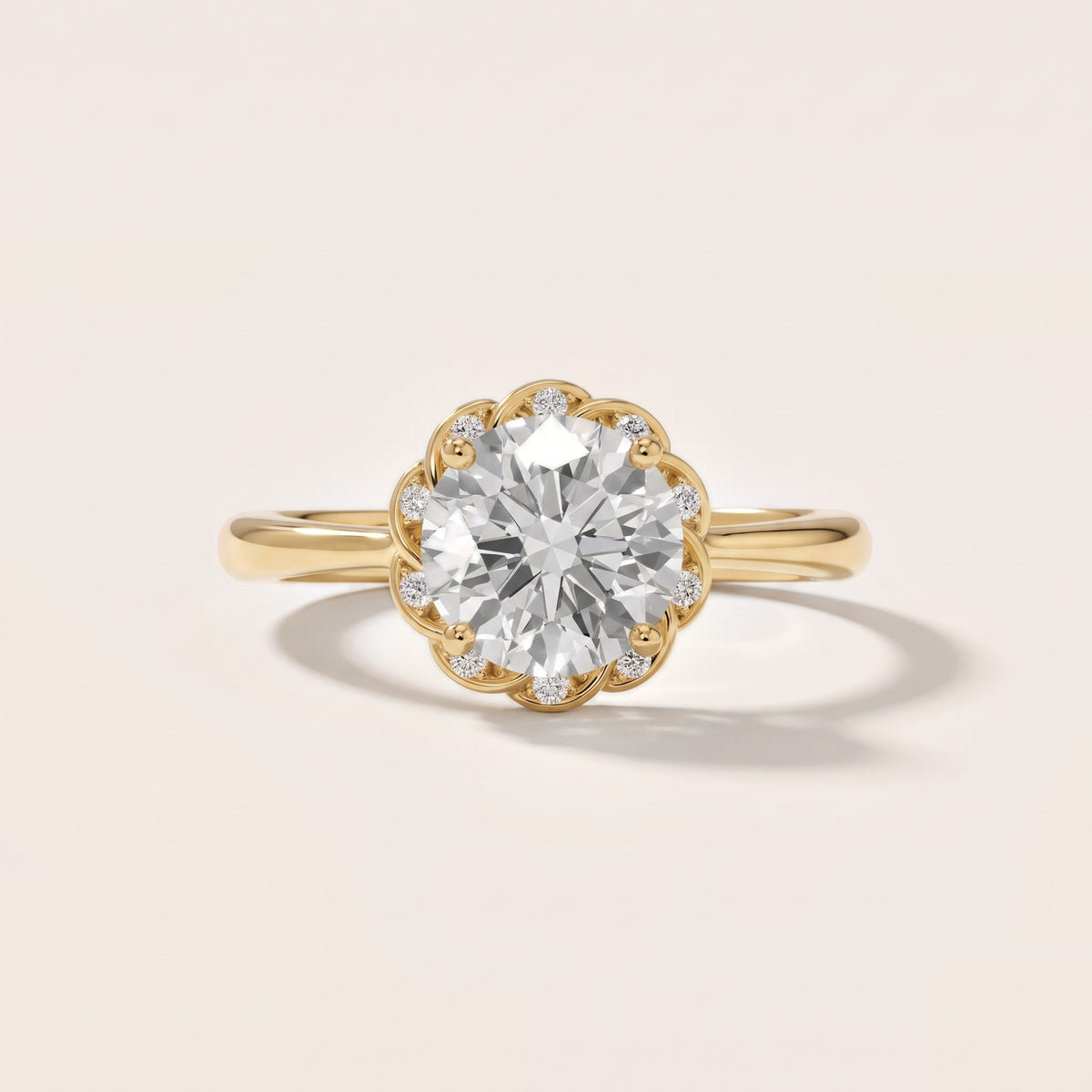 Trudy Floral Halo Round Diamond Engagement Ring in Yellow Gold - front.jpg