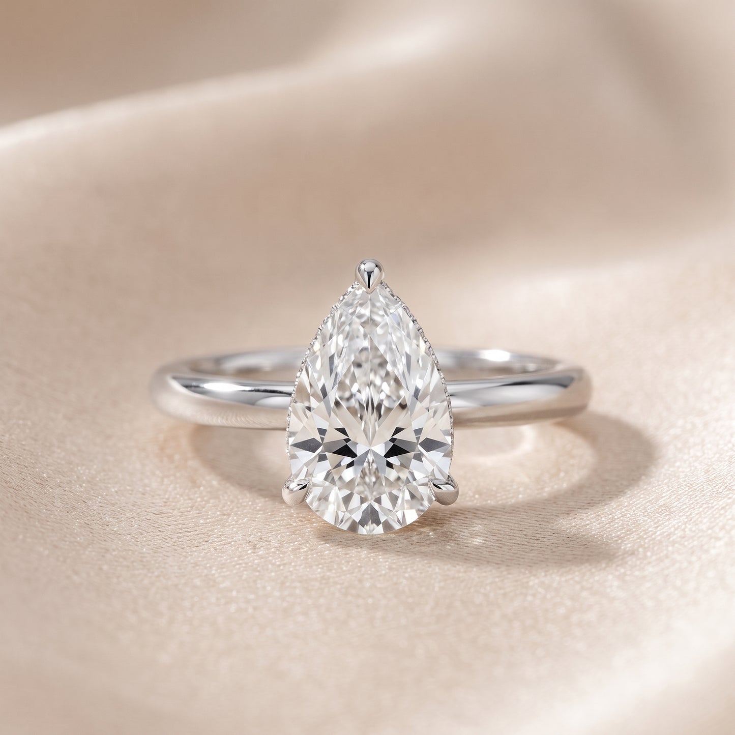 Amaya Hidden Halo Pear Diamond Ring in Silver - front.jpg