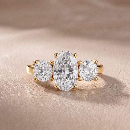 Callie Three-Stone Trellis Oval Diamond Engagement Ring in Yellow Gold - front.jpg