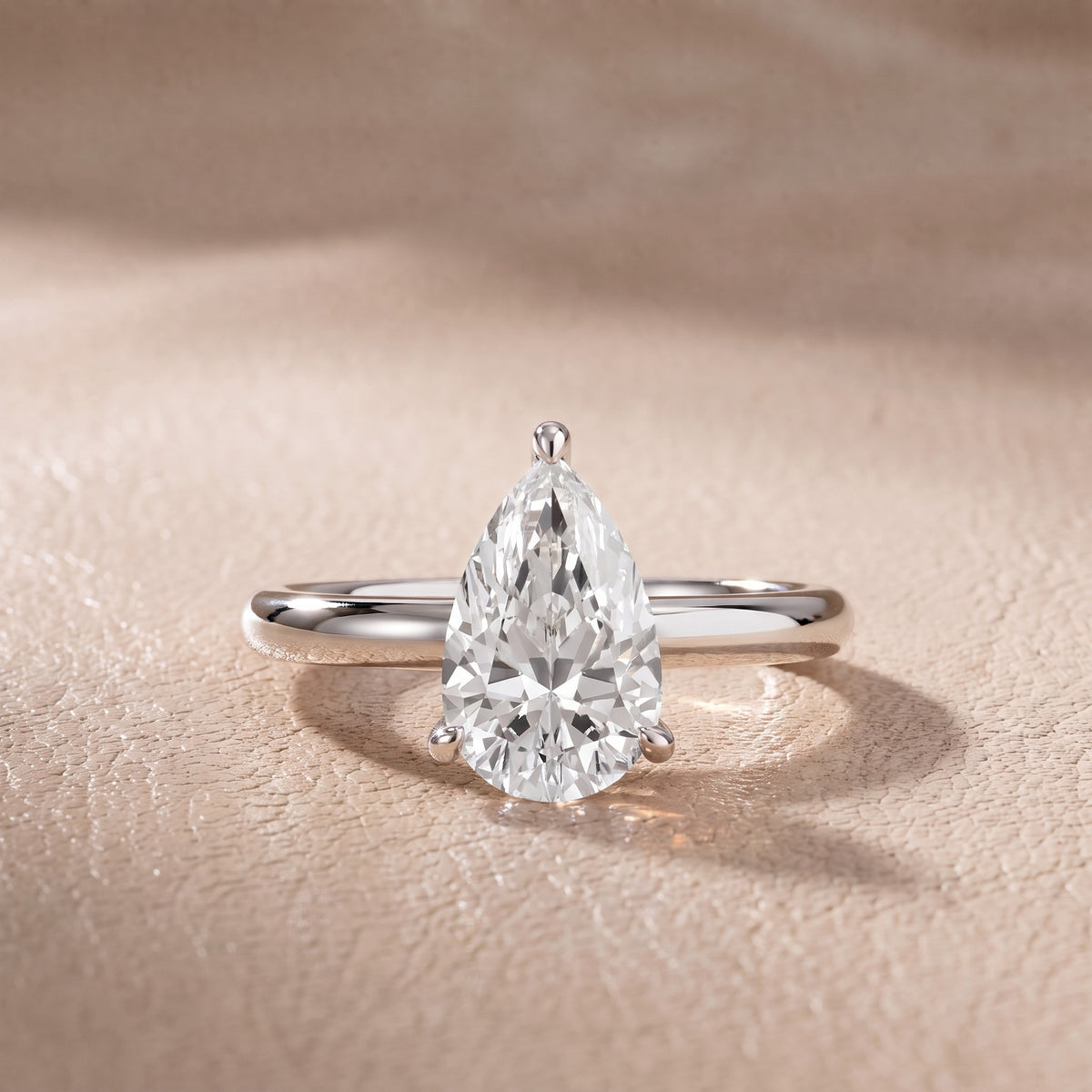 Amaya Hidden Halo Pear Diamond Engagement Ring in White Gold - front.jpg