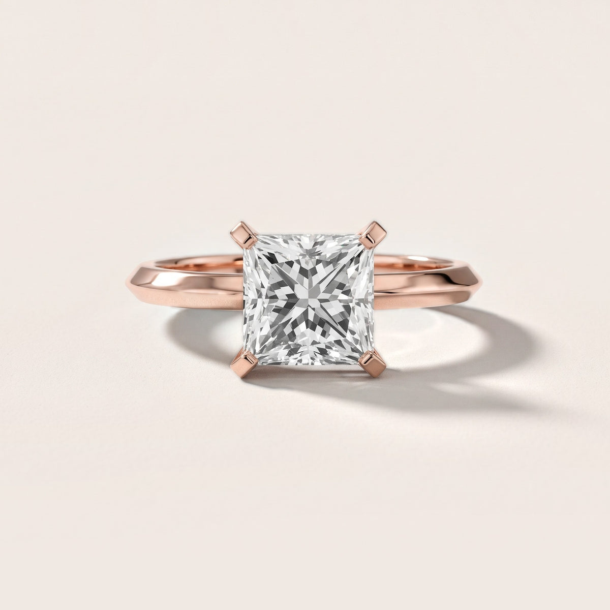Verity Solitaire Knife Edge Princess Diamond Engagement Ring in Rose Gold - front.jpg