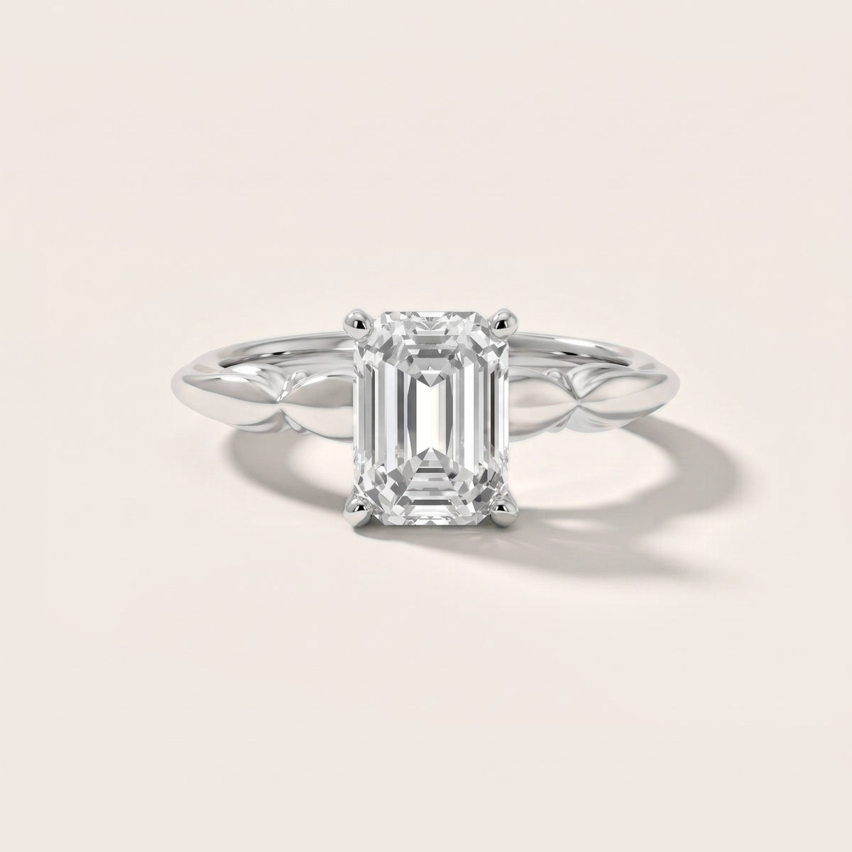 Verena Engraved Leaf Emerald Diamond Engagement Ring in Platinum - front.jpg
