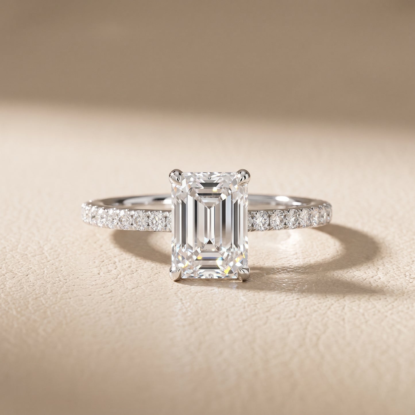 Ione Solitaire Pavé Emerald Diamond Engagement Ring in White Gold - front.jpg
