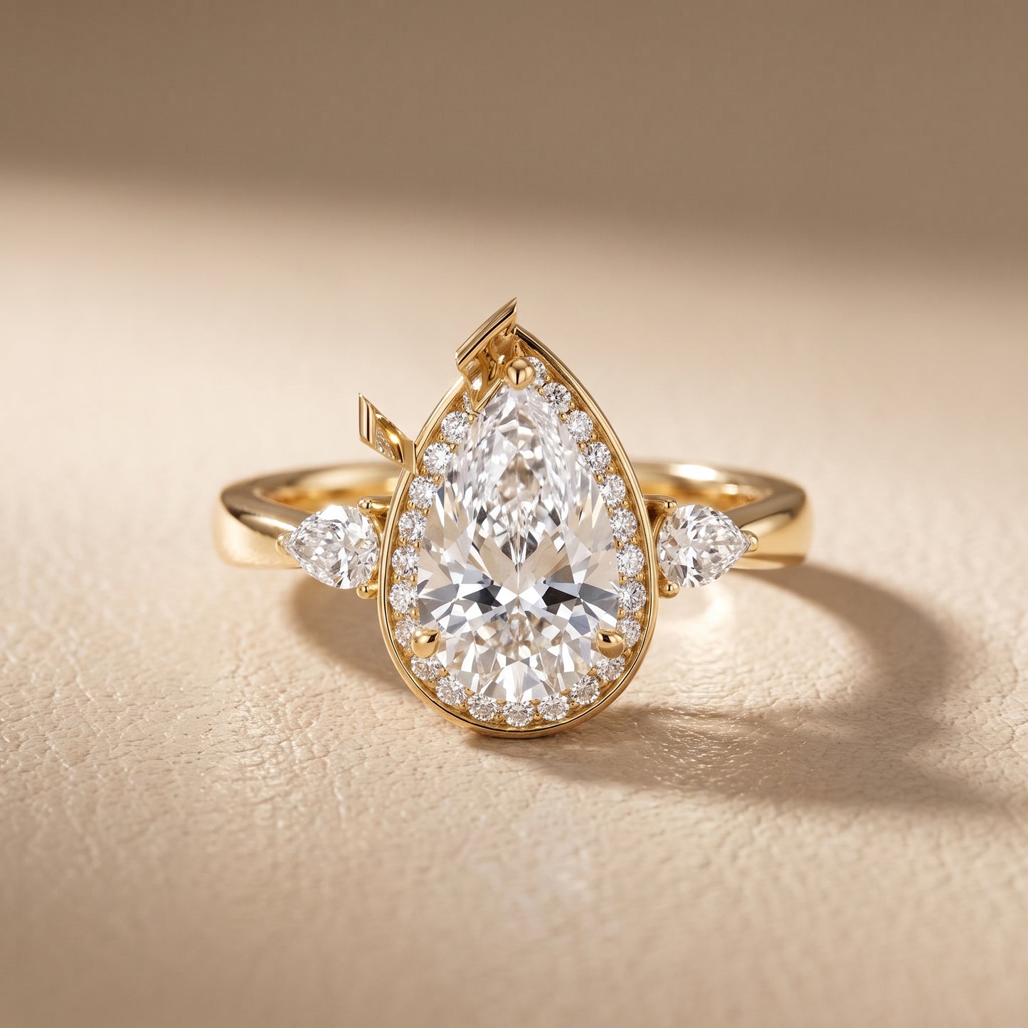 Eliza Halo Sidestone Pear Diamond Engagement Ring in Yellow Gold - front.jpg