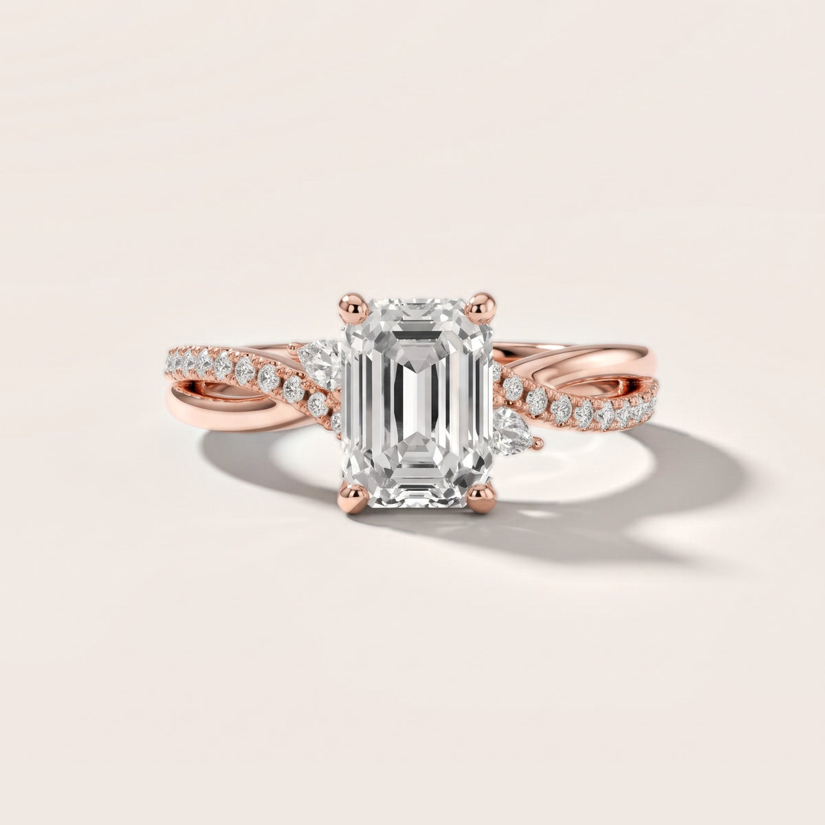 Reno Pear-Side Twist Emerald Diamond Engagement Ring in Rose Gold - front.jpg