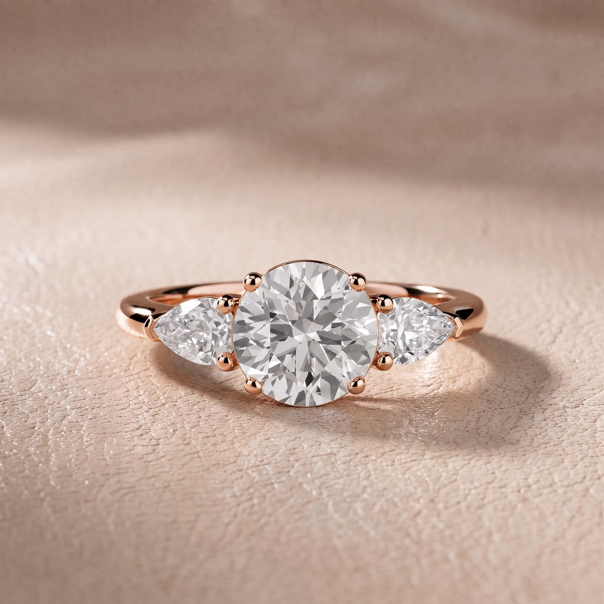 Sophia Three-Stone Round Diamond Engagement Ring in Rose Gold - front.jpg