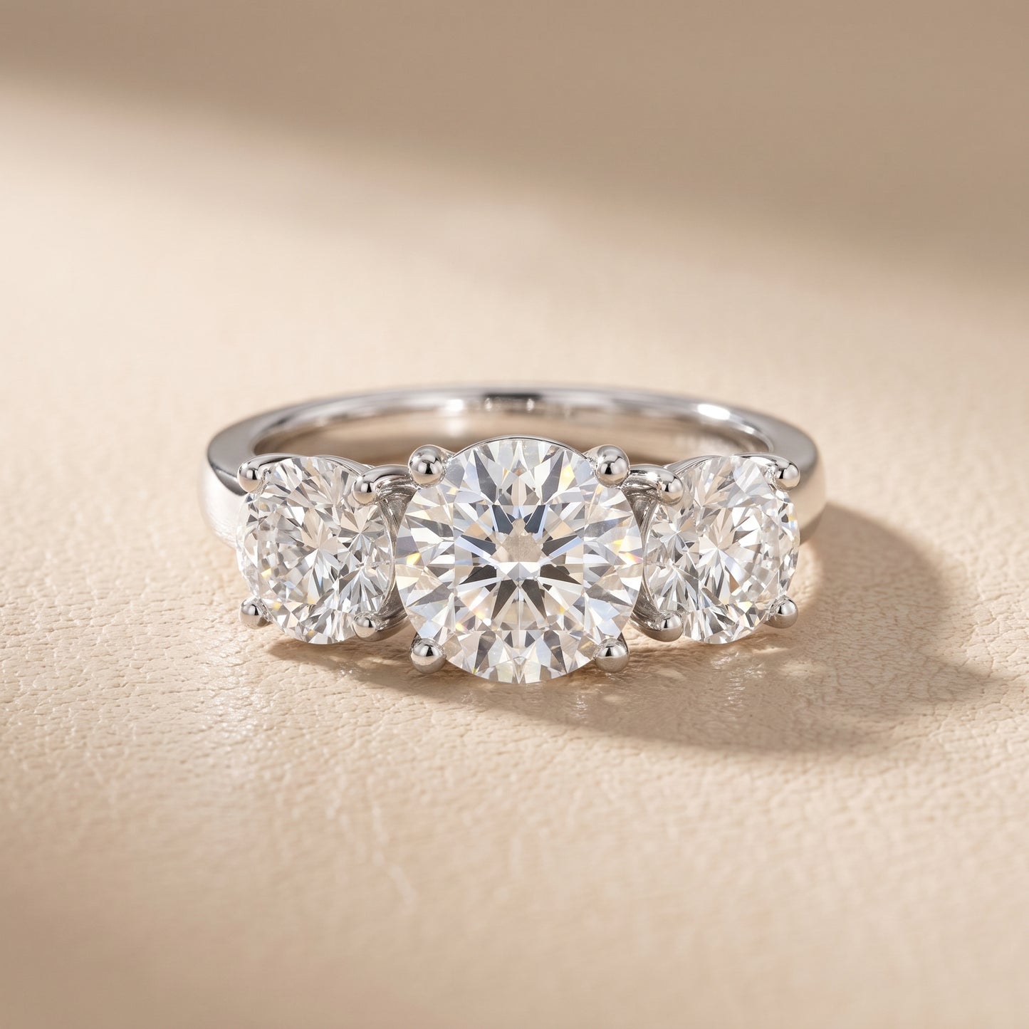 Esme Three-Stone Tapered Round Diamond Ring in White Gold - front.jpg