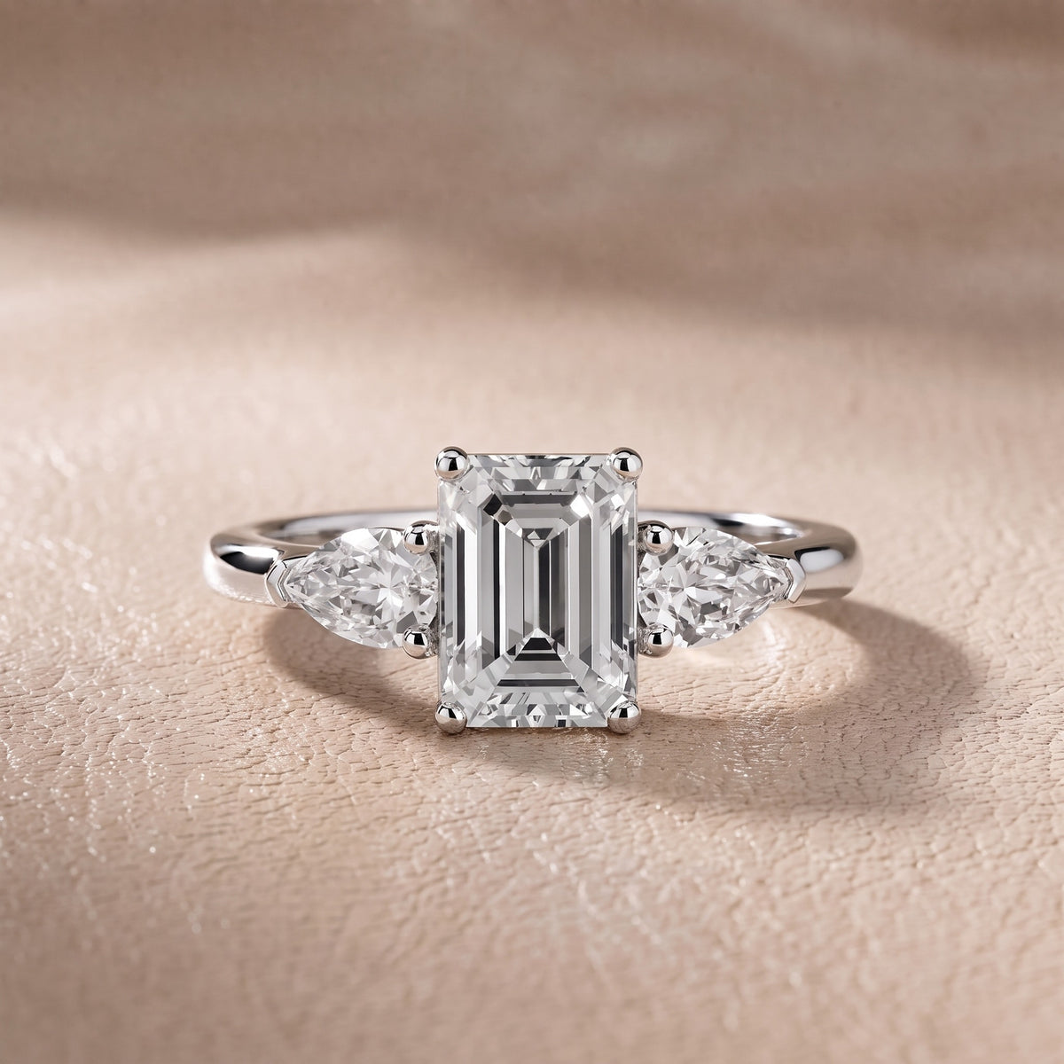 Sophia Three-Stone Emerald Diamond Engagement Ring in Platinum - front.jpg