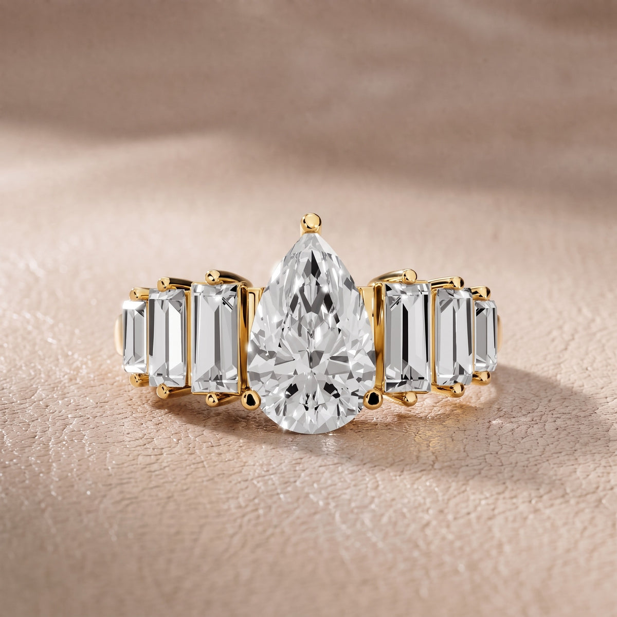 Mara Sidestone Baguette Accent Pear Diamond Engagement Ring in Yellow Gold - front.jpg