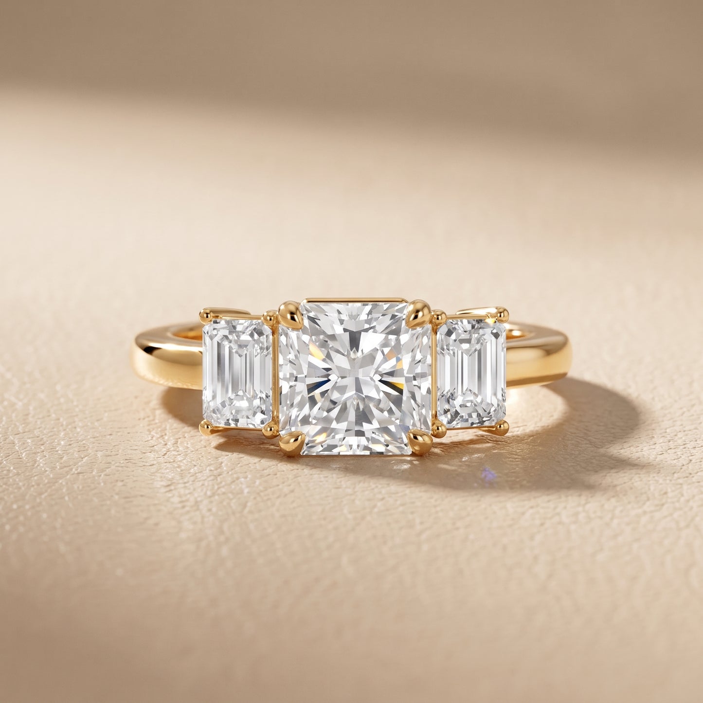 Zoe Three-Stone Radiant Diamond Ring in Yellow Gold - front.jpg