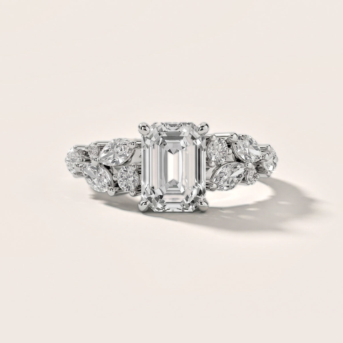 Kelsey Leaf Cluster Emerald Diamond Engagement Ring in Platinum - front.jpg