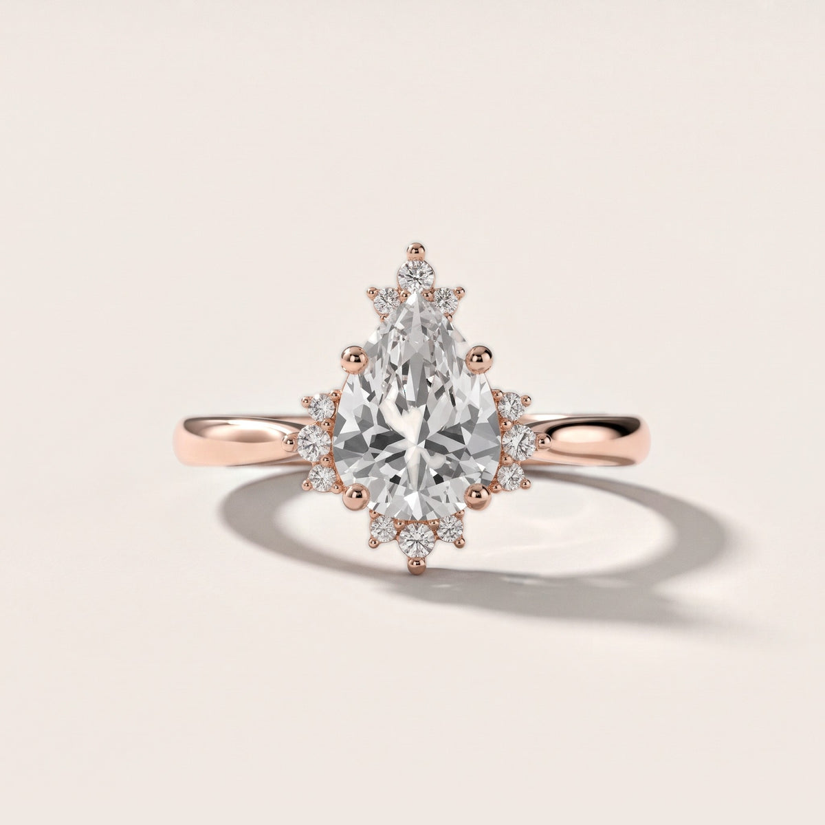 Linden Starburst Cluster Pear Diamond Engagement Ring in Rose Gold - front.jpg