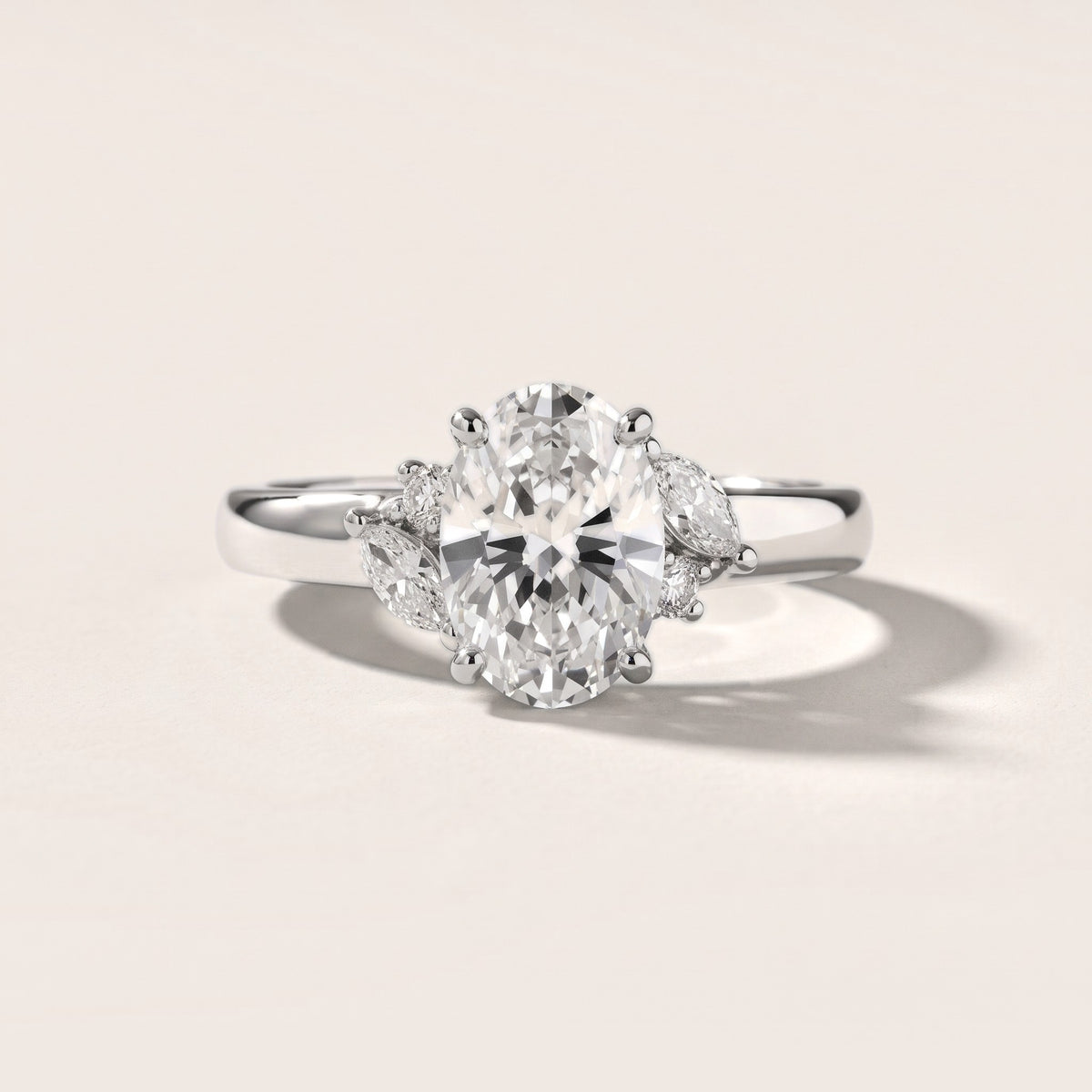 Napa Leaf Cluster Oval Diamond Engagement Ring in White Gold - front.jpg