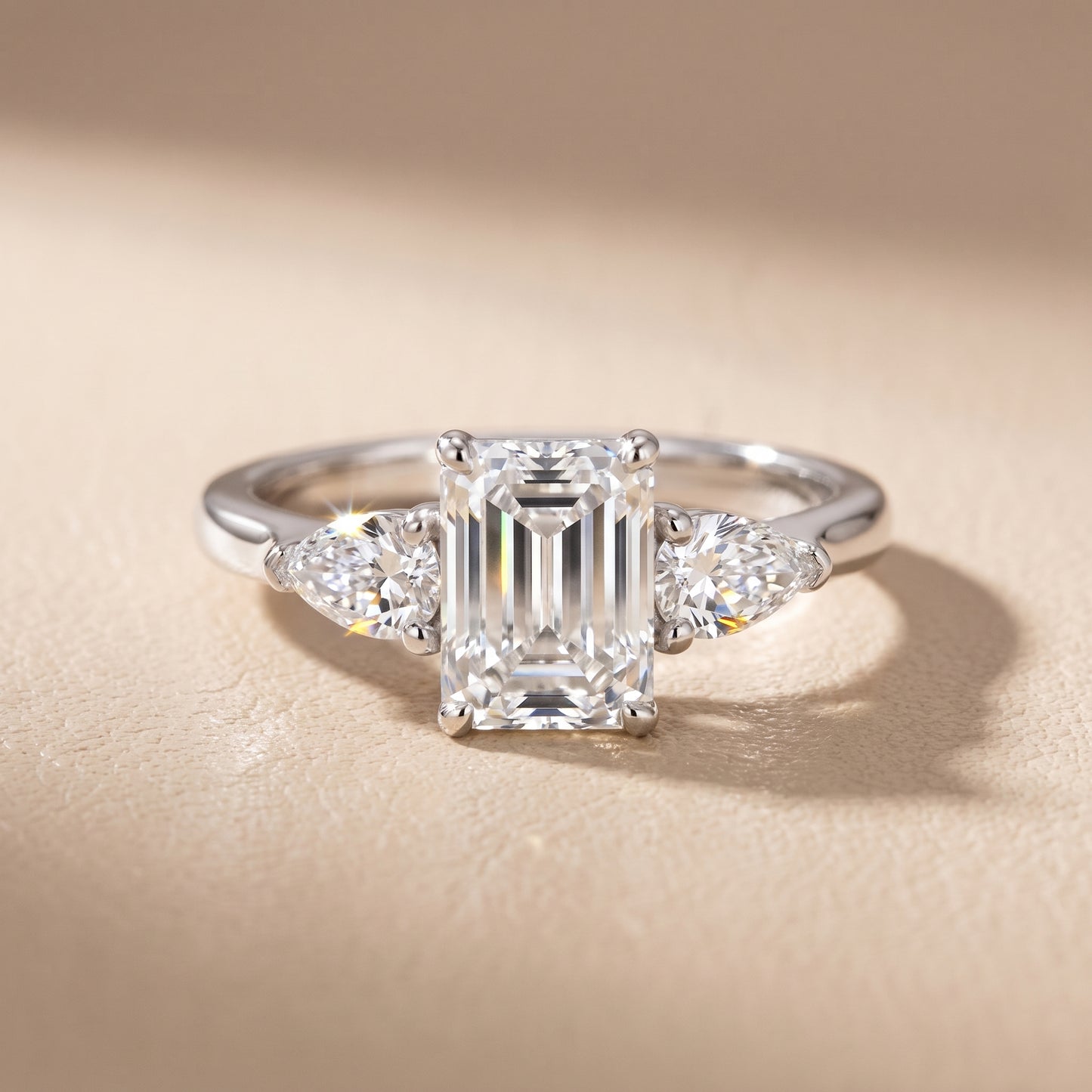 Mirabel Three-Stone Emerald Diamond Engagement Ring in Platinum - front.jpg