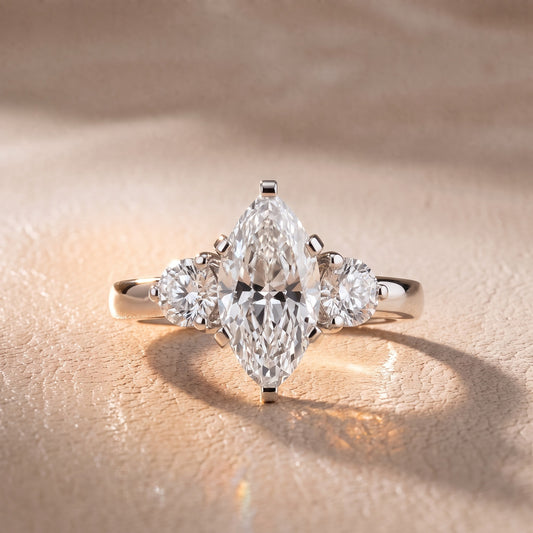 Freesia Three-Stone Marquise Diamond Engagement Ring in Platinum - front.jpg