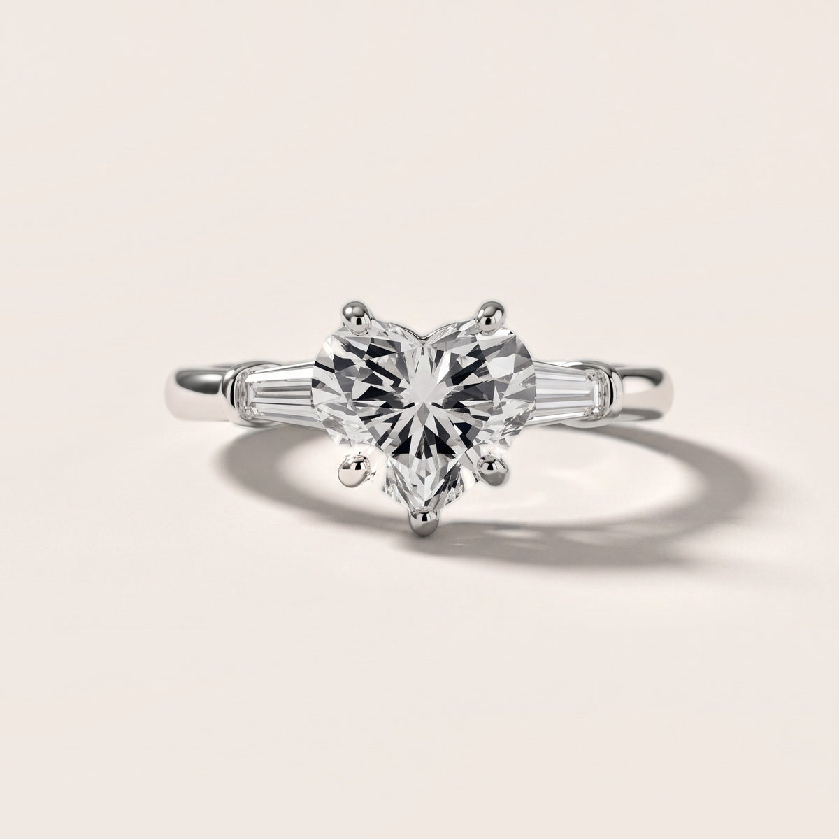 Abby Baguette Three-Stone Heart Diamond Engagement Ring in Platinum - front.jpg