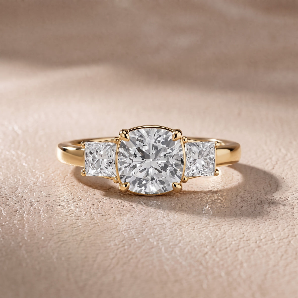 Aria Three-Stone Basket Cushion Diamond Engagement Ring in Yellow Gold - front.jpg