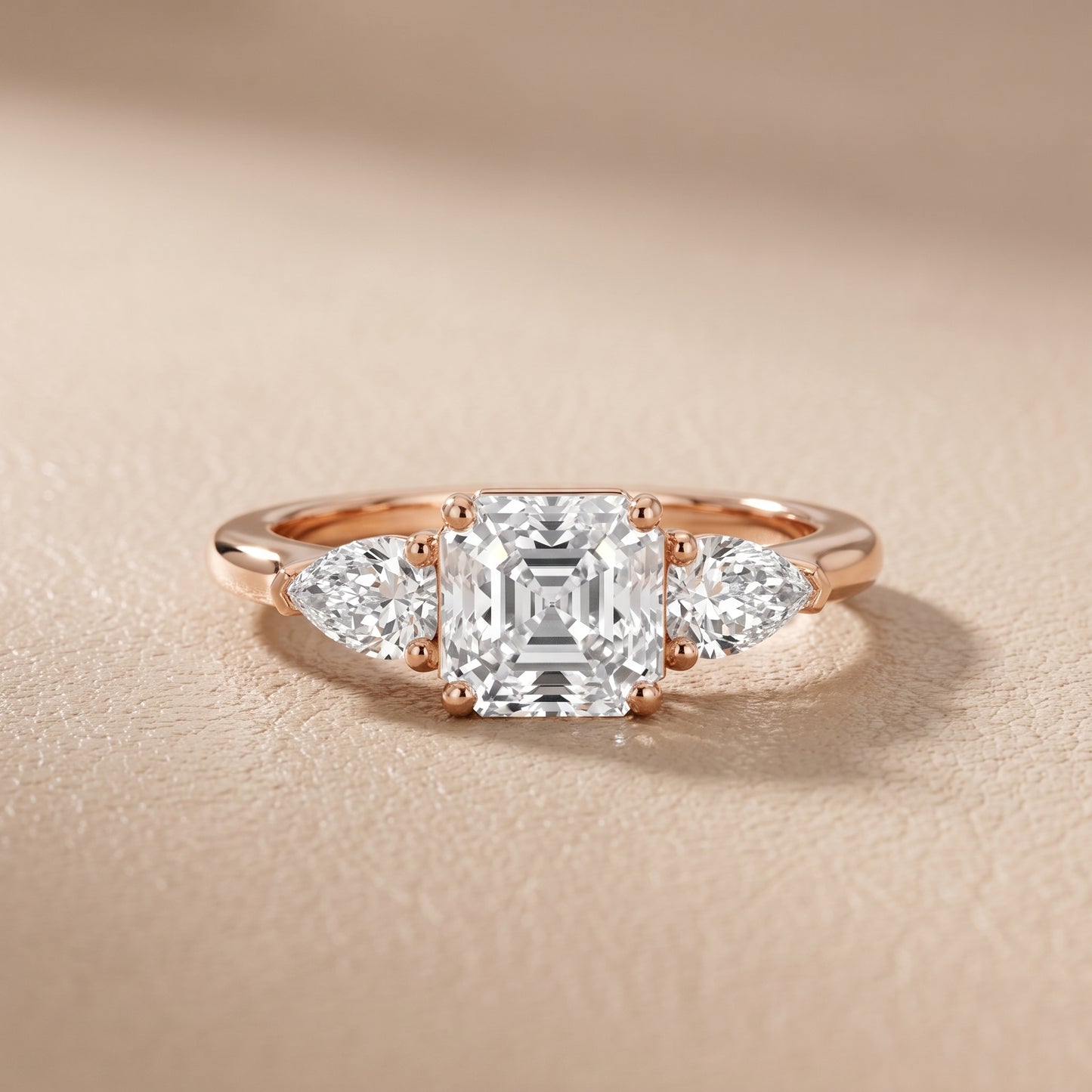Mirabel Three-Stone Asscher Diamond Engagement Ring in Rose Gold - front.jpg