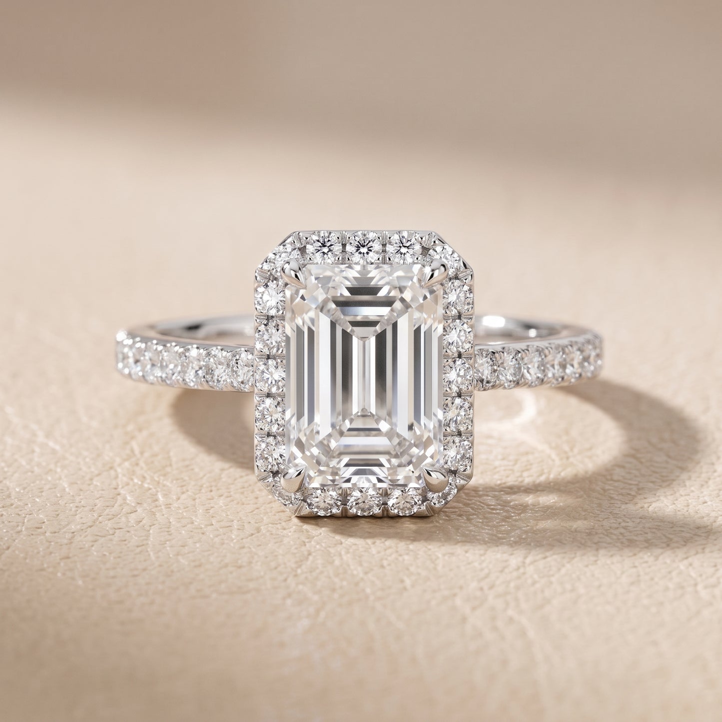 Alma Halo Pavé Emerald Diamond Ring in Platinum - front.jpg