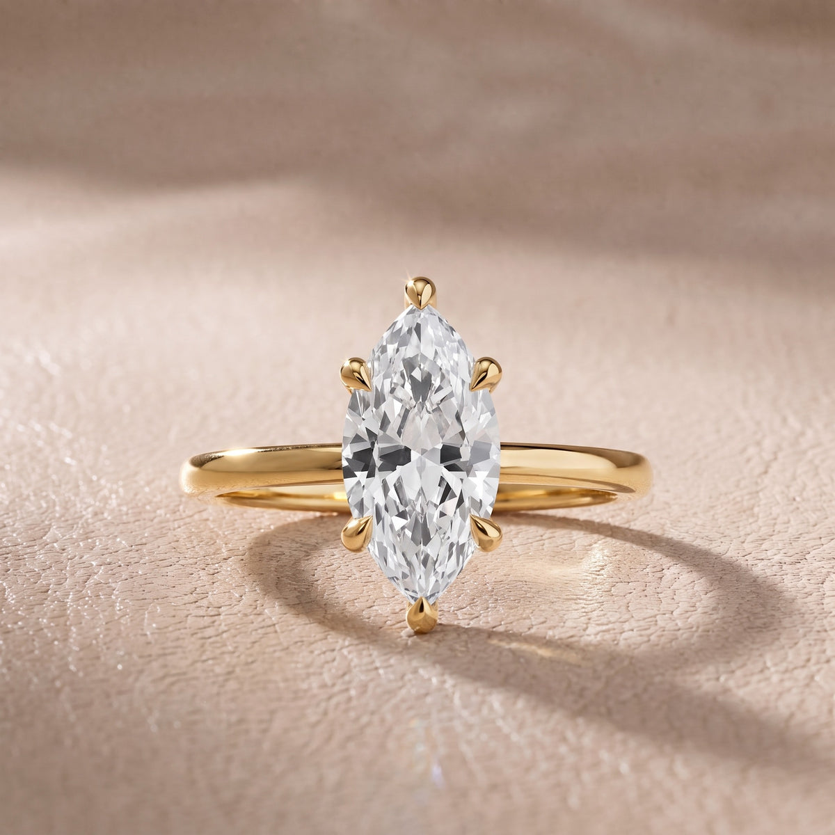 Nella Petite Solitaire Marquise Diamond Engagement Ring in Yellow Gold - front.jpg