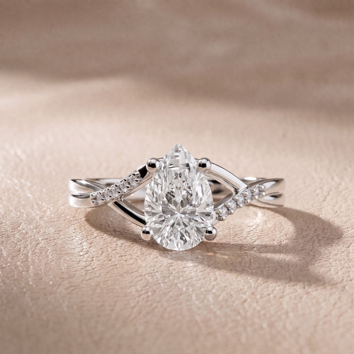 Veronica Twist Side Stone Pear Diamond Engagement Ring in White Gold - front.jpg