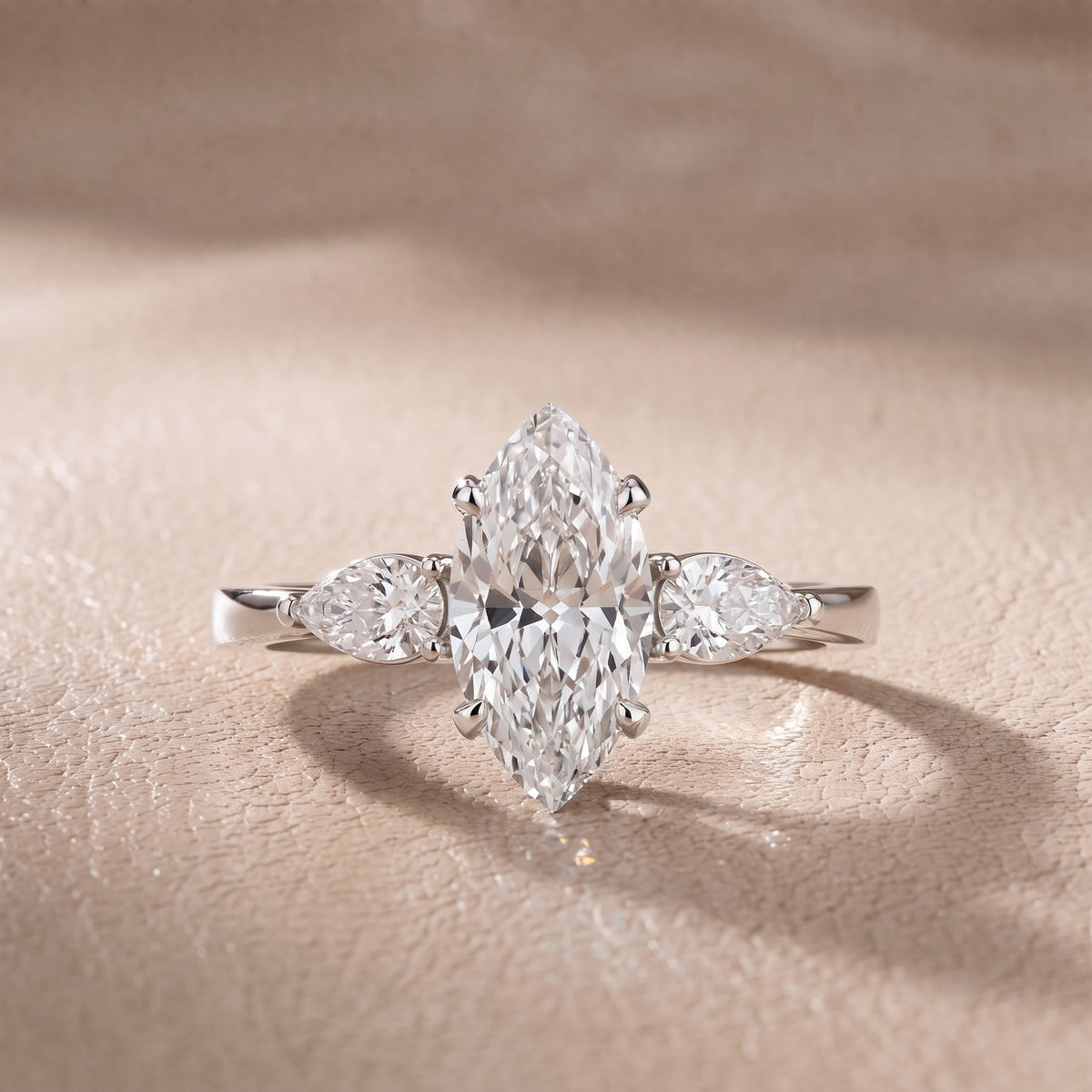 Grace Three Stone Marquise Diamond Engagement Ring in Platinum - front.jpg