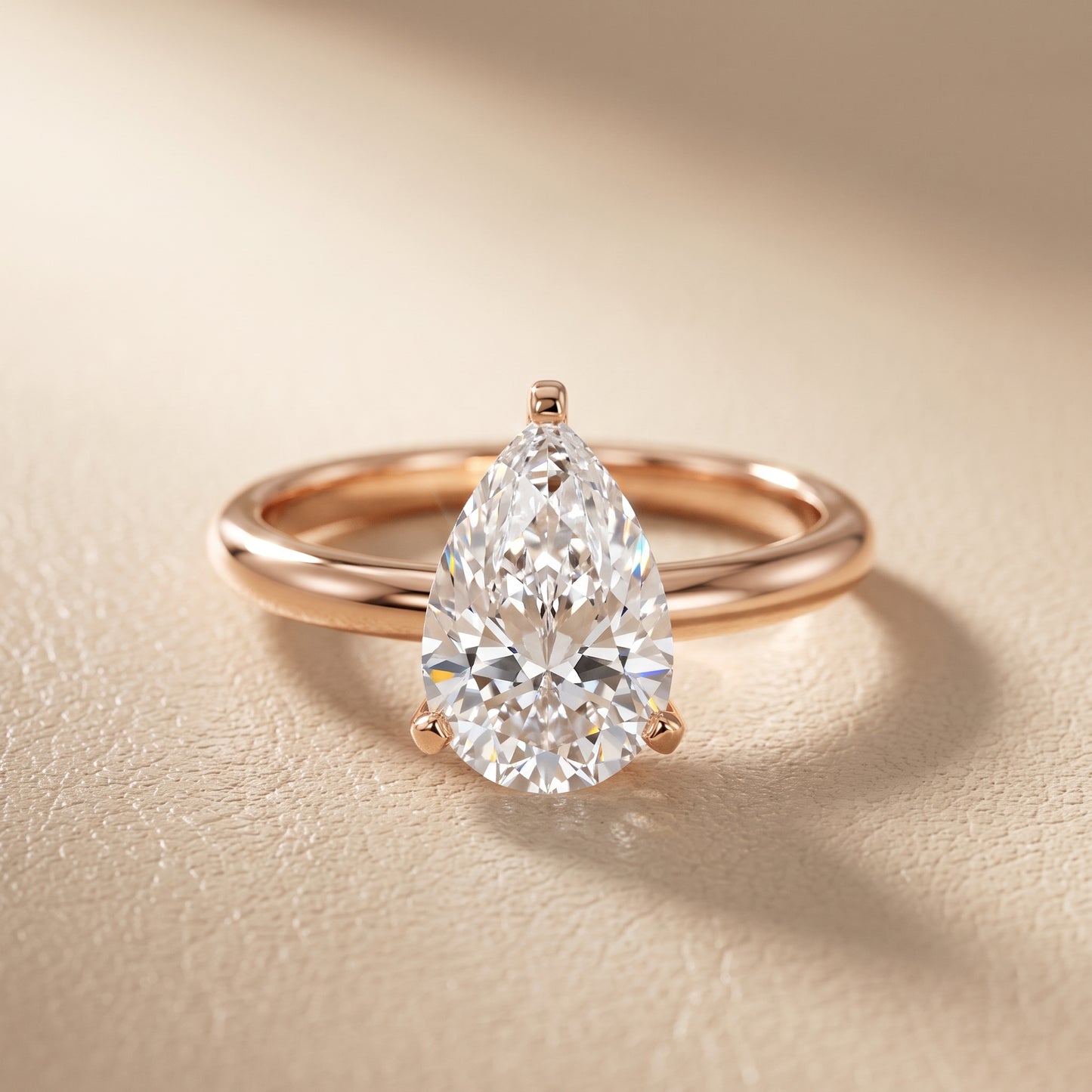 Wren Solitaire Pear Diamond Ring in Rose Gold - front.jpg