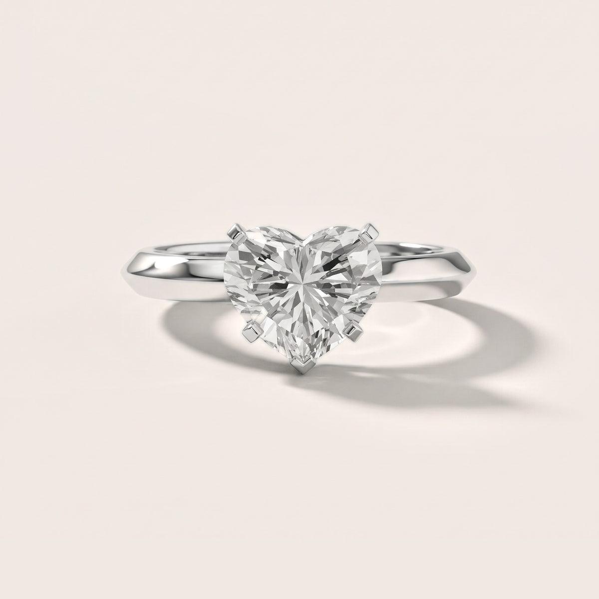 Hailey Solitaire Knife Edge Heart Diamond Engagement Ring in Platinum - front.jpg