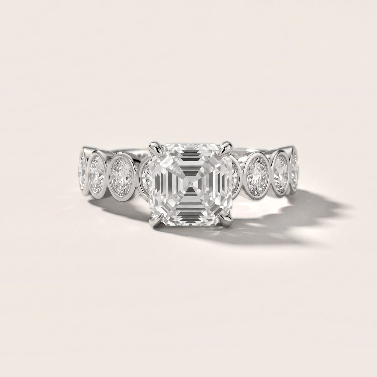 Vittoria Graduated Bezel Asscher Diamond Engagement Ring in Platinum - front.jpg